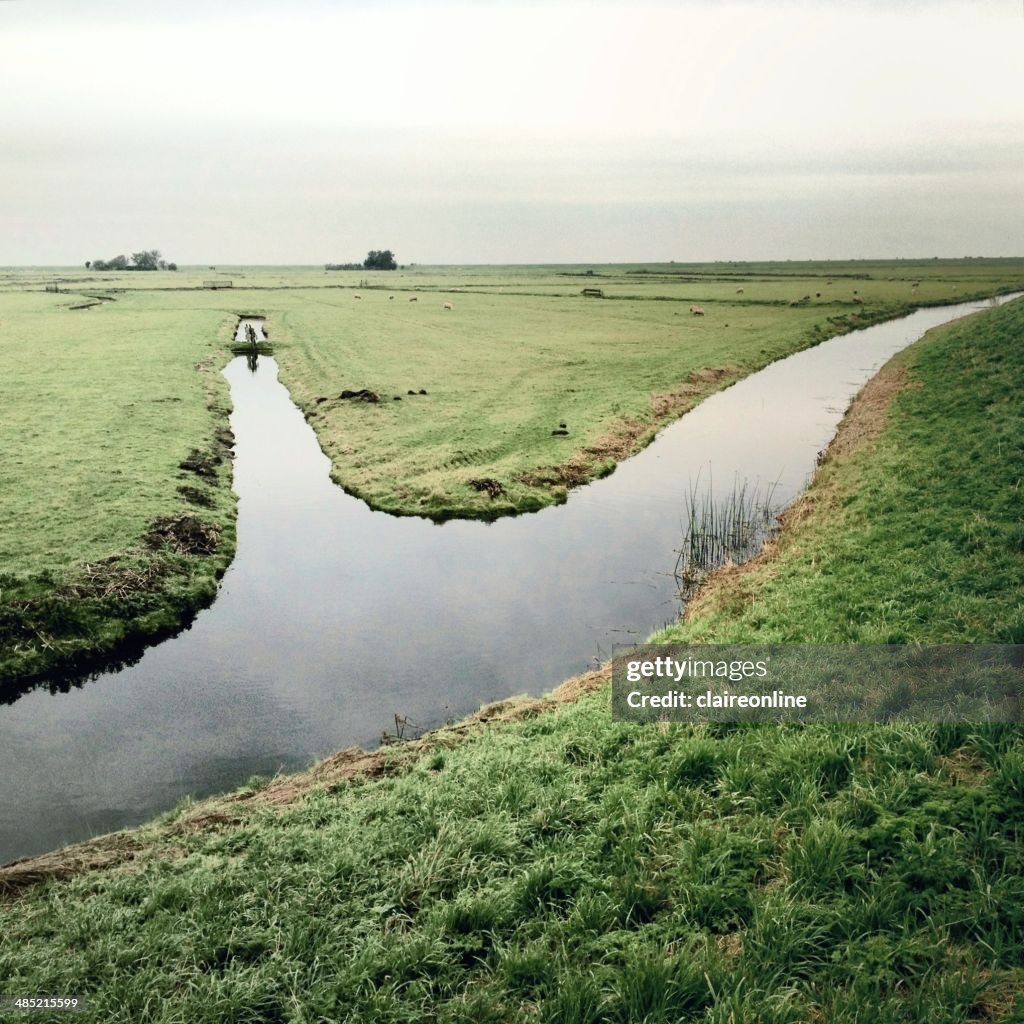 Landscape with river and field