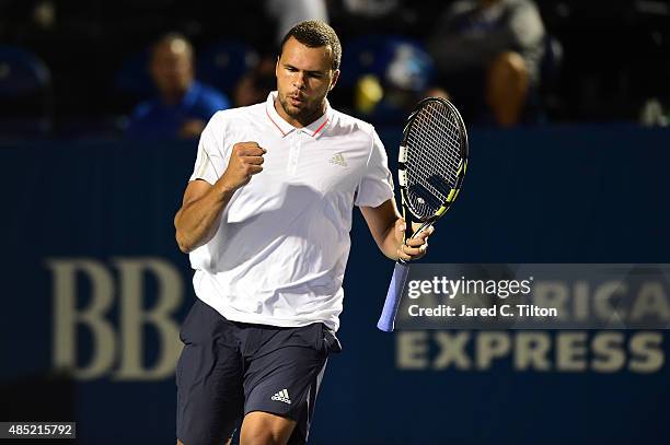 Jo-Wilfried Tsonga of France celebrates after after a point against Denis Istomin of Uzbekistan during the second day of the Winston-Salem Open at...