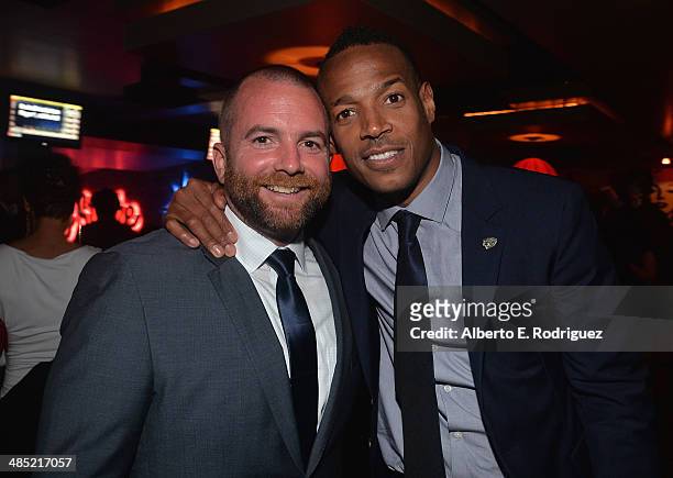 Director Michael Tiddes and actor Marlon Wayans attend the after party for the premiere of Open Road Films' "A Haunted House 2" at on April 16, 2014...