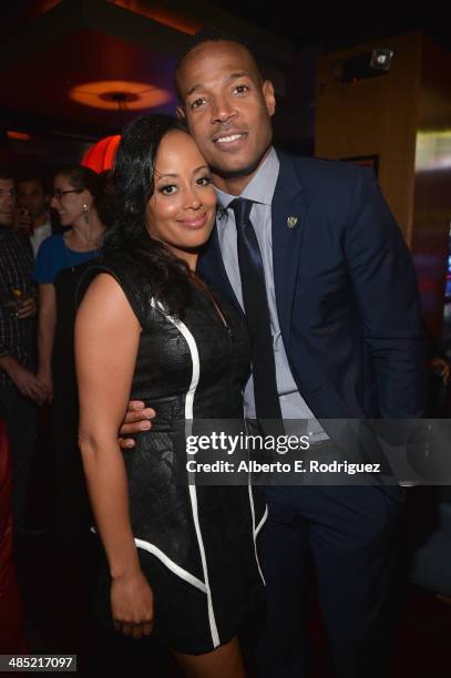 Actors Essence Atkins and Marlon Wayans attend the after party for the premiere of Open Road Films' "A Haunted House 2" at on April 16, 2014 in Los...