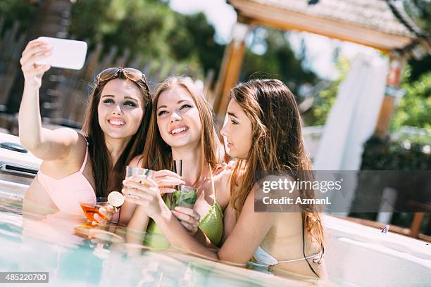 selfie in hot tub - hot tub party stock pictures, royalty-free photos & images