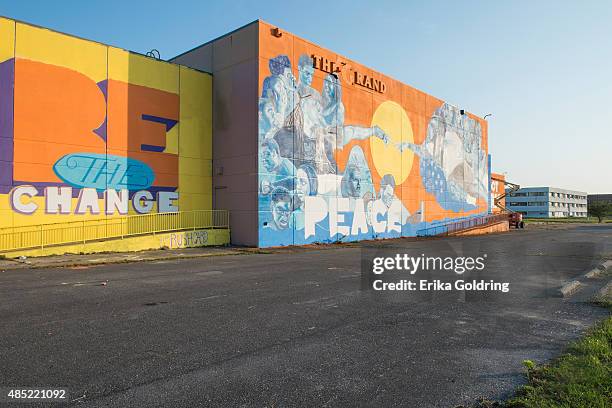 Brandan "BMike" Odums' Wall of Peace mural nears completion on The Grand Theater, vacant since Hurricane Katrina, on August 25, 2015 in New Orleans,...