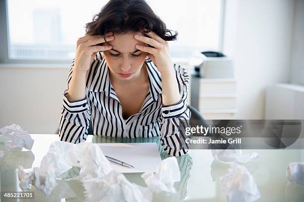 overworked businesswoman sitting at desk - rejection bildbanksfoton och bilder
