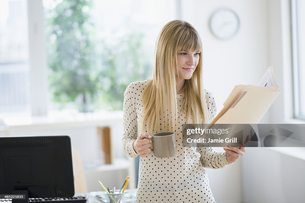 Female designer working in office