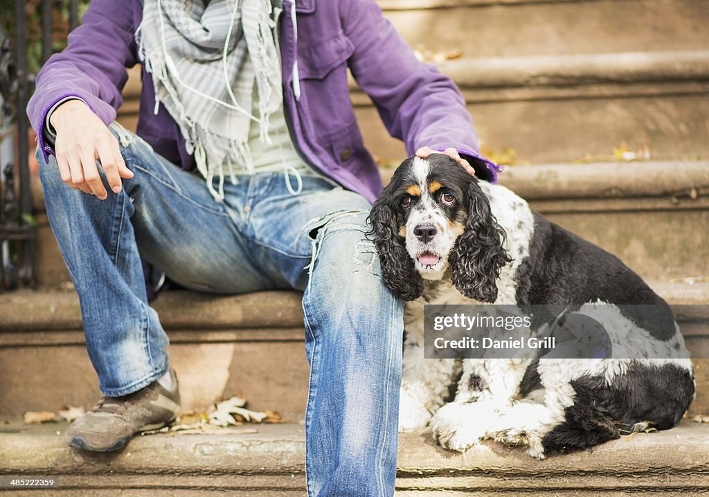 Teenage boy(16-17) with dog