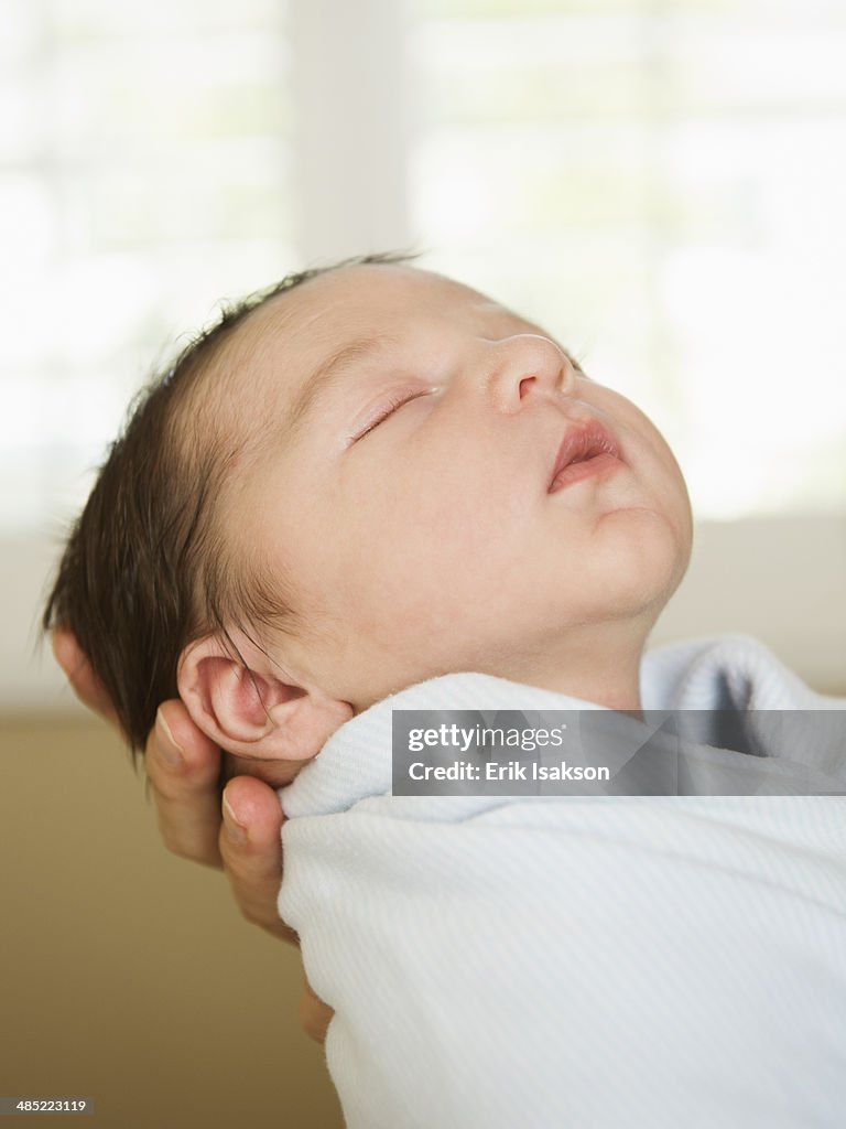 USA, California, Ladera Ranch, Portrait of newborn baby boy (0-1 months) sleeping