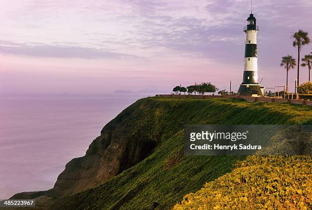 peru, lima, miraflores, lighthouse at sunset - lima ストックフォトと画像