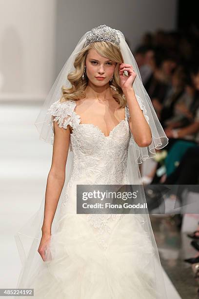 Model showcases designs by John Zimmerman Couture during the New Zealand Weddings Magazine Collection show at New Zealand Fashion Week 2015 on August...