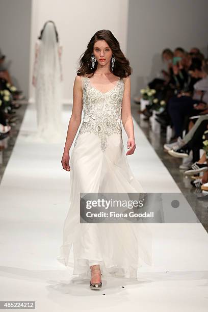 Model showcases designs by John Zimmerman Couture during the New Zealand Weddings Magazine Collection show at New Zealand Fashion Week 2015 on August...