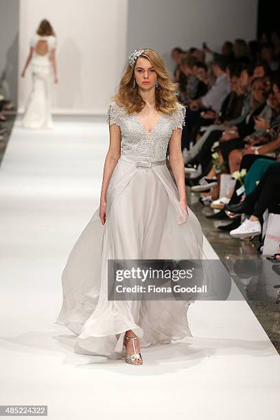 Model showcases designs by John Zimmerman Couture during the New Zealand Weddings Magazine Collection show at New Zealand Fashion Week 2015 on August...