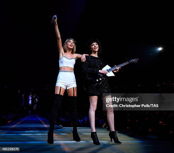 Singer-songwriters Taylor Swift and St. Vincent perform onstage during Taylor Swift The 1989 World Tour Live In Los Angeles at Staples Center on...