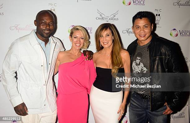 Jimmy Jean-Louis, Amanda Whitis, Cindy Cowan, and Cung Le attend Linda's Voice hosts BBQ and Bikinis benefit at Mr. C Beverly Hills on August 25,...