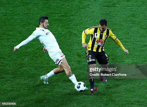 Robert Koren of Melbourne City is challenged by Manny Muscat of the Phoenix during the FFA Cup Round of 16 match between Melbourne City FC and...