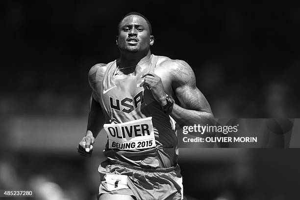 S David Oliver competes in a heat of the men's 110 metres hurdles athletics event at the 2015 IAAF World Championships at the "Bird's Nest" National...