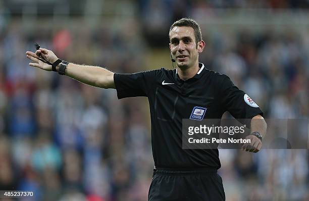 Referee David Coote in action during the Capital One Cup Second Round between Newcastle United and Northampton Town at St James' Park on August 25,...