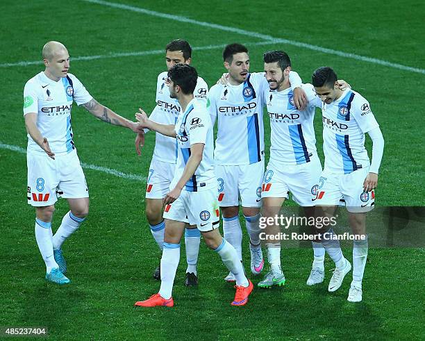 Robert Koren of Melbourne City celebrates with team mates after scoring a goal during the FFA Cup Round of 16 match between Melbourne City FC and...