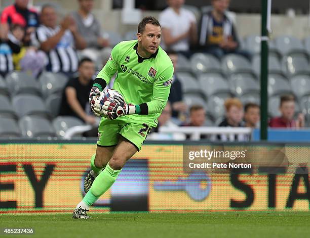 Ryan Clarke of Northampton Town in action during the Capital One Cup Second Round between Newcastle United and Northampton Town at St James' Park on...