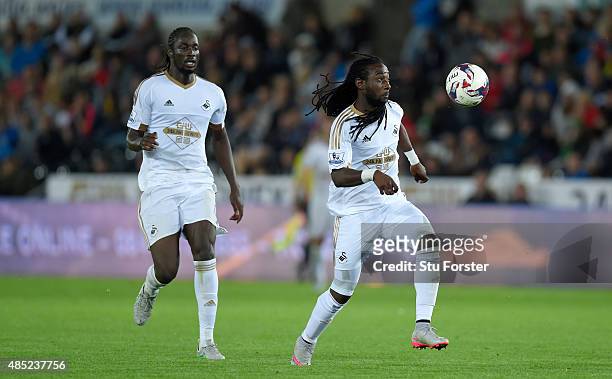 Swansea player Marvin Emnes with Eder in action during the Capital One Cup Second Round match between Swansea City and York City at Liberty Stadium...