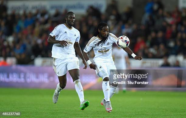 Swansea player Marvin Emnes with Eder in action during the Capital One Cup Second Round match between Swansea City and York City at Liberty Stadium...