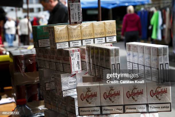 Several different brands of cigarettes on display for sale at a market on April 15, 2014 in Slubice, Poland. Slubice the first Polish city behind the...