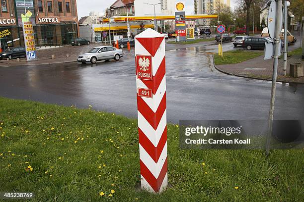 View of a Polish border stone on a grass verge on April 15, 2014 in Slubice, Poland. Slubice the first Polish city behind the German-Polish border....