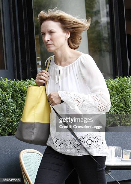 Presenter Fiona Bruce takes her dog for a walk on August 20, 2015 in London, England.