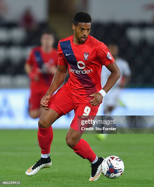 Vadaine Oliver of York in action during the Capital One Cup Second Round match between Swansea City and York City at Liberty Stadium on August 25,...