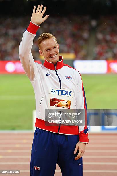 Gold medalist Greg Rutherford of Great Britain poses on the podium during the medal ceremony for the Men's Long Jump final during day five of the...