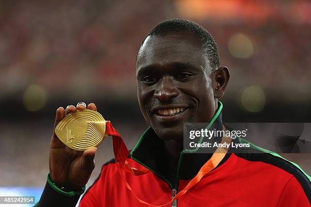 Gold medalist David Lekuta Rudisha of Kenya poses on the podium during the medal ceremony for the Men's 800 metres during day five of the 15th IAAF...