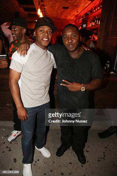 Tyran "Ty Ty" Smith and Lil Cease attend the Manhattan Brew & Vine Grand Opening at Manhattan Brew & Vine on August 25 in New York City.