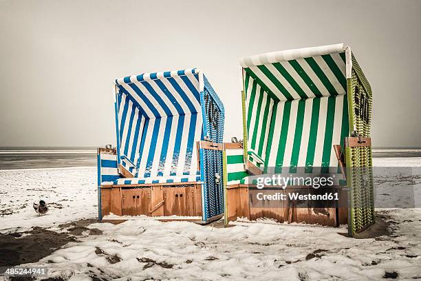 germany, lower saxony, beach chairs at the beach of langeoog - east frisian islands stock pictures, royalty-free photos & images