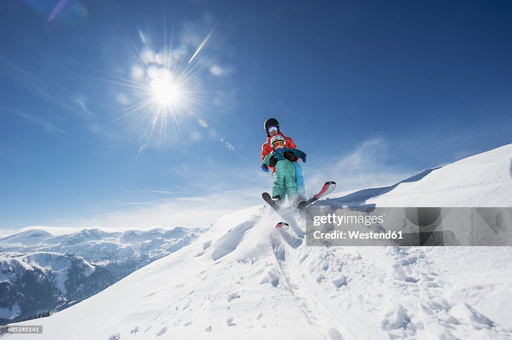 Austria, Salzburg Country, Altenmarkt-Zauchensee, Family skiing in mountains