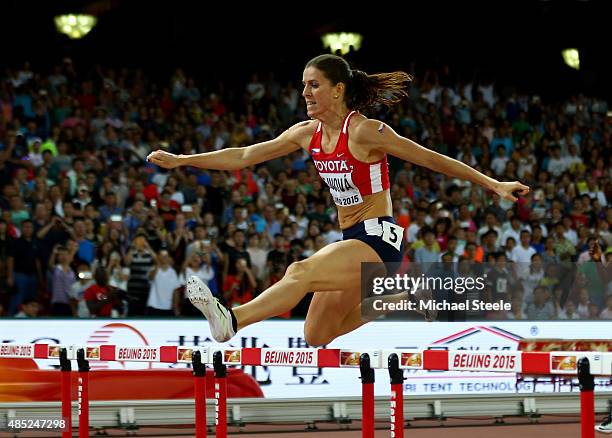 Zuzana Hejnova of the Czech Republic on her way to winning gold in the Women's 400 metres hurdles final during day five of the 15th IAAF World...