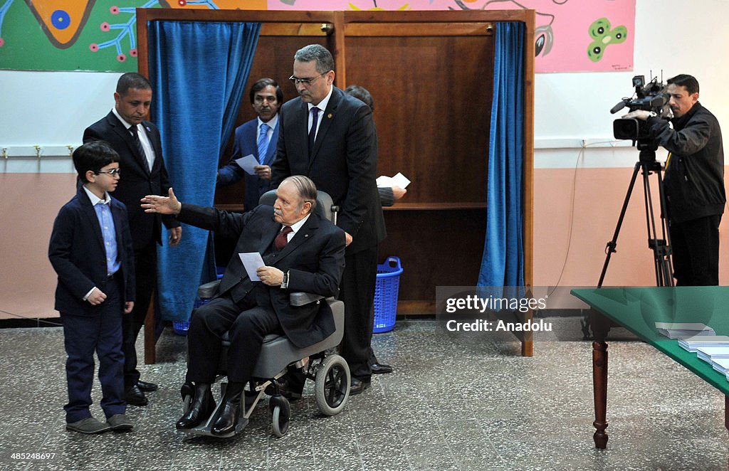 Bouteflika, on wheelchair, votes in Algeria presidential elections