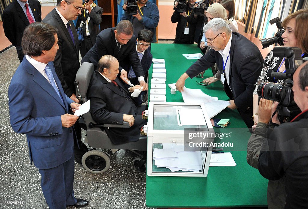 Bouteflika, on wheelchair, votes in Algeria presidential elections