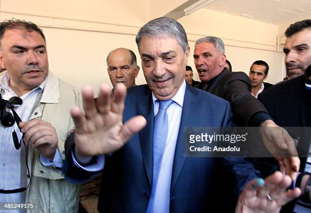 APRIl 17: Algerian presidential candidate Ali Benflis casts his ballot in the Algeria's presidential elections in Algiers, Algeria on April 17, 2014....