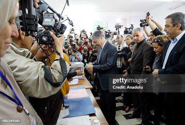 APRIl 17: Algerian presidential candidate Ali Benflis prepares to vote in the Algeria's presidential elections in Algiers, Algeria on April 17, 2014....