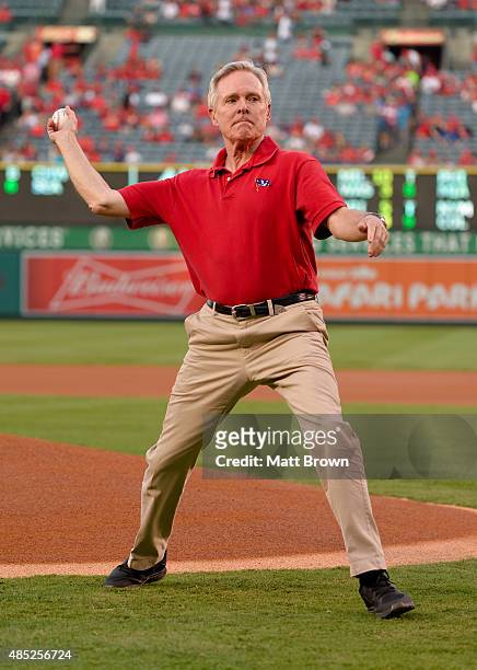 Secretary of the Navy Ray Mabus throws a ceremonial first pitch before the game between the Toronto Blue Jays and the Los Angeles Angels of Anaheim...