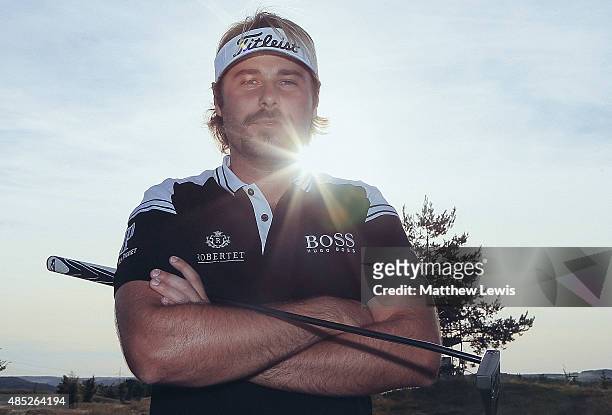 Victor Dubuisson of France poses for a portrait during a practice round ahead of the D+D Real Czech Masters at Albatross Golf Resort on August 26,...