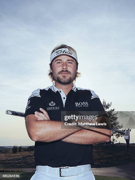 Victor Dubuisson of France poses for a portrait during a practice round ahead of the D+D Real Czech Masters at Albatross Golf Resort on August 26,...