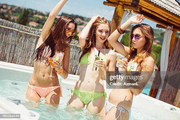 dancing in hot tub - hot tub party stock pictures, royalty-free photos & images