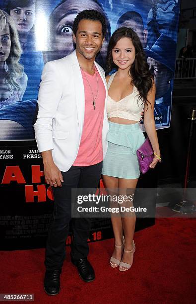 Actor Corbin Bleu and Sasha Clements arrive at the Los Angeles premiere of "A Haunted House 2" at Regal Cinemas L.A. Live on April 16, 2014 in Los...