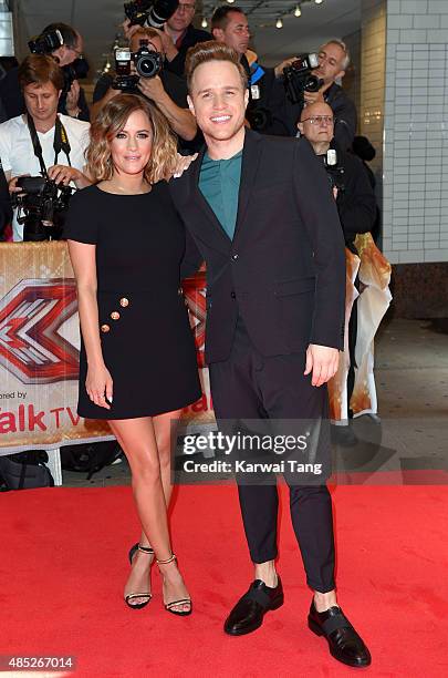 Caroline Flack and Olly Murs attend the press launch of "The X Factor" at the Picturehouse Central on August 26, 2015 in London, England.