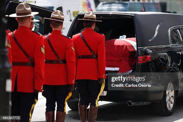 The body of former Finance Minister Jim Flaherty is led into St. James Cathedral during his state funeral on April 16, 2014. Carlos Osorio/Toronto...