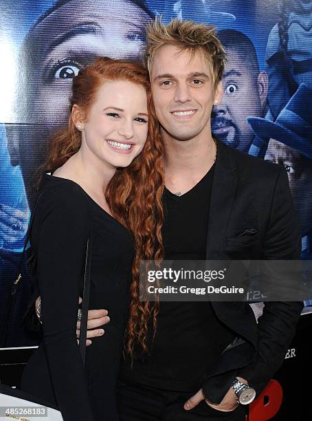 Singer Aaron Carter and guest arrive at the Los Angeles premiere of "A Haunted House 2" at Regal Cinemas L.A. Live on April 16, 2014 in Los Angeles,...