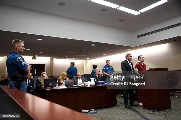 James Holmes appears in court, with his attorney Daniel King, to be formally sentenced as the prosecution team looks on. The formal sentencing...