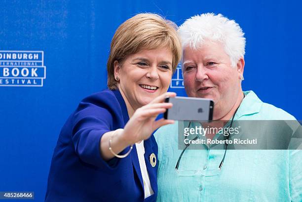 First Minister of Scotland Nicola Sturgeon and Scottish crime writer Val McDermid attend a photocall at Edinburgh International Book Festival on...