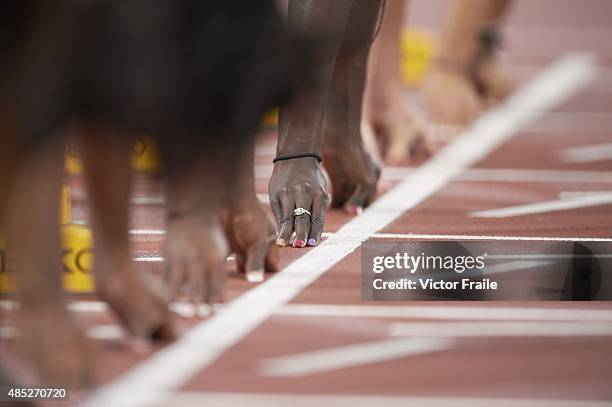15th IAAF World Championships: View of USA Tori Bowie hands at starting line on track before Women's 100M Semifinal at National Stadium. Beijing,...