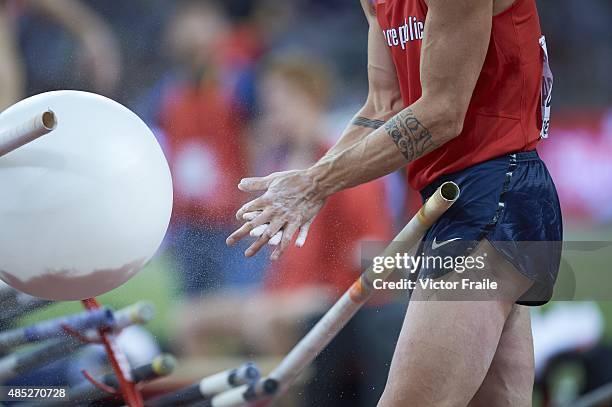 15th IAAF World Championships: Closeup view of Czech Republic Michal Balner rubbing chalk on hands during Men's Pole Vault at National Stadium....