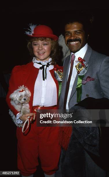 Stars of the TV show "The Love Boat" Jill Whelan and Ted Lange attend the Hollywood Christmas Parade in December 1980 in Los Angeles, California.